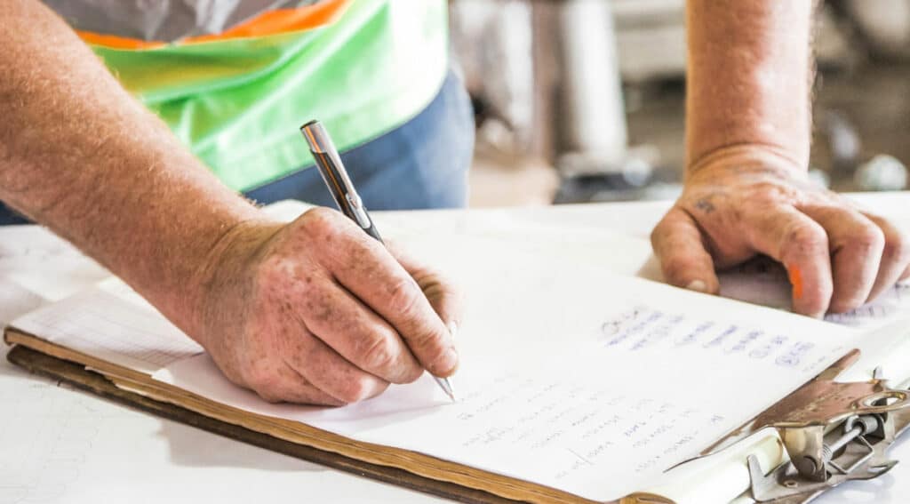 construction worker with clip board